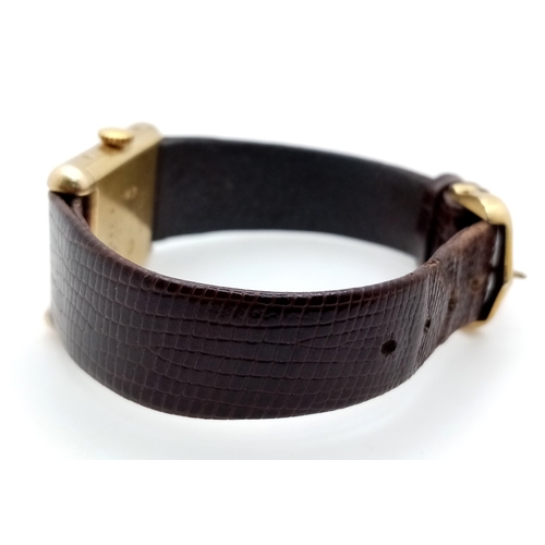 145 - A Cartier Vintage, Gilded 925 Silver Ladies Tank Watch. Model - 166320. Brown leather strap. Tank ca... 