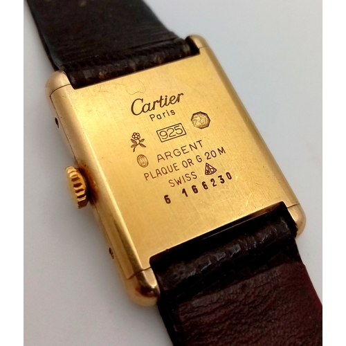 145 - A Cartier Vintage, Gilded 925 Silver Ladies Tank Watch. Model - 166320. Brown leather strap. Tank ca... 