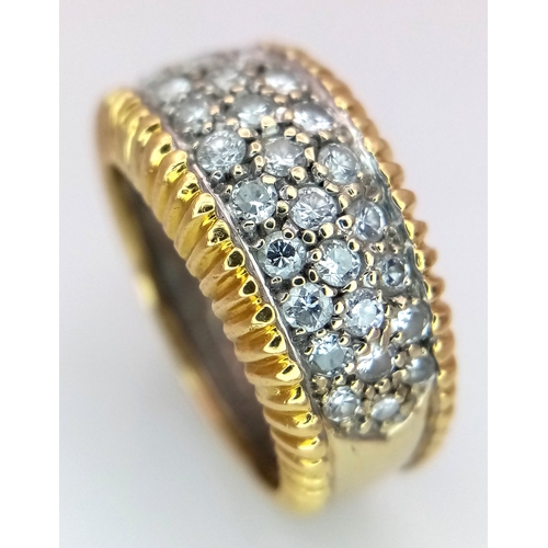 26 - An 18K Yellow Gold Diamond Pave Ring. c.1ctw round brilliant cut diamonds. 11mm width at front. Size... 