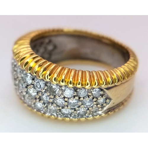 26 - An 18K Yellow Gold Diamond Pave Ring. c.1ctw round brilliant cut diamonds. 11mm width at front. Size... 