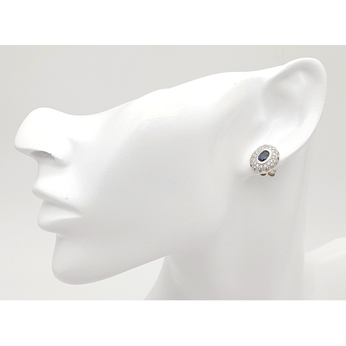 13 - A PAIR OF 18K WHITE GOLD DIAMOND & SAPPHIRE OVAL STUD EARRINGS 6.5G TOTAL WEIGHT, 1CM x 1.2CM. REF: ... 