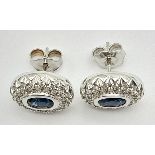 13 - A PAIR OF 18K WHITE GOLD DIAMOND & SAPPHIRE OVAL STUD EARRINGS 6.5G TOTAL WEIGHT, 1CM x 1.2CM. REF: ... 