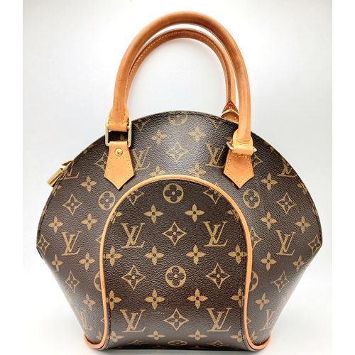 124 - A Louis Vuitton Monogram Ellipse Bag. Coated canvas exterior with leather trim, gold-toned hardware,... 