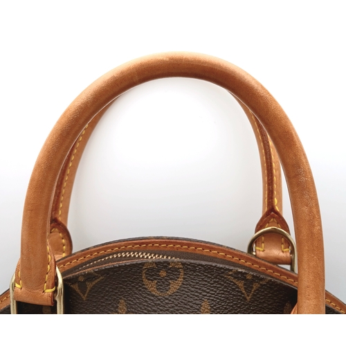 124 - A Louis Vuitton Monogram Ellipse Bag. Coated canvas exterior with leather trim, gold-toned hardware,... 