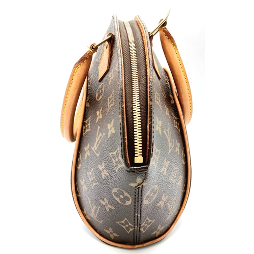 124 - A Louis Vuitton Monogram Ellipse Bag. Coated canvas exterior with leather trim, gold-toned hardware,... 