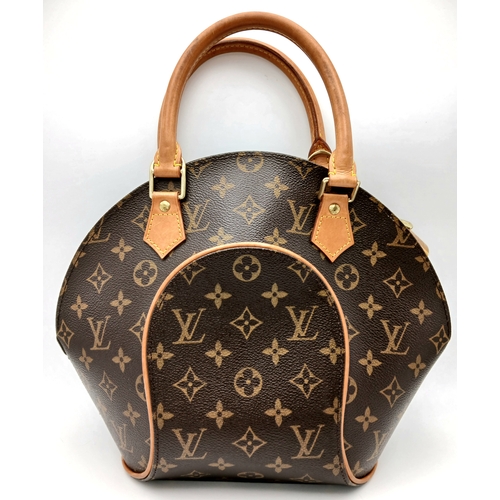 124 - A Louis Vuitton Monogram Ellipse Bag. Coated canvas exterior with leather trim, gold-toned hardware,... 