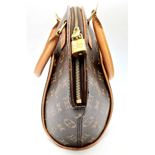 124 - A Louis Vuitton Monogram Ellipse Bag. Coated canvas exterior with leather trim, gold-toned hardware,... 