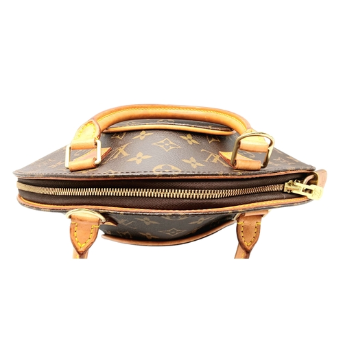 124 - A Louis Vuitton Monogram Ellipse Bag. Coated canvas exterior with leather trim, gold-toned hardware,... 