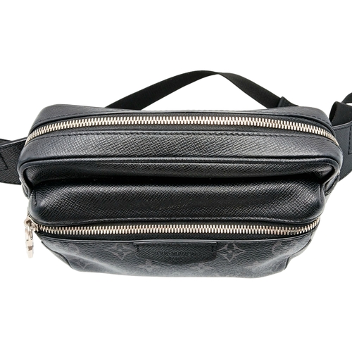 160 - A Louis Vuitton Black Monogram Bum Bag/Fanny Pack. Coated canvas and leather exterior with silver-to... 