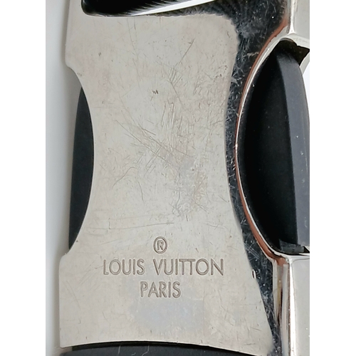 160 - A Louis Vuitton Black Monogram Bum Bag/Fanny Pack. Coated canvas and leather exterior with silver-to... 