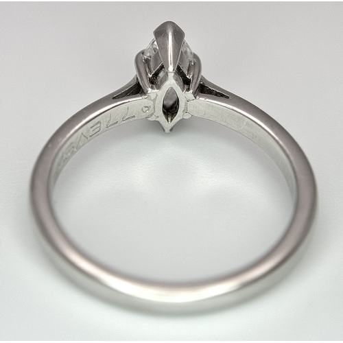174 - A 950 Platinum, Diamond Solitaire Ring. 0.77ct Marquise cut. VS2. E colour. Comes with two certifica... 