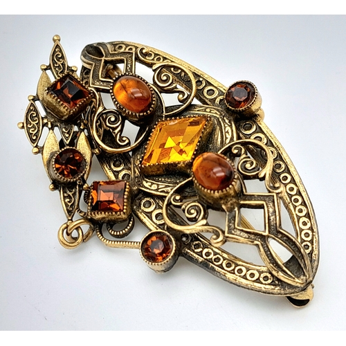 50 - A Vintage  'Original by Robert' Citrine Brooch. 6cm.