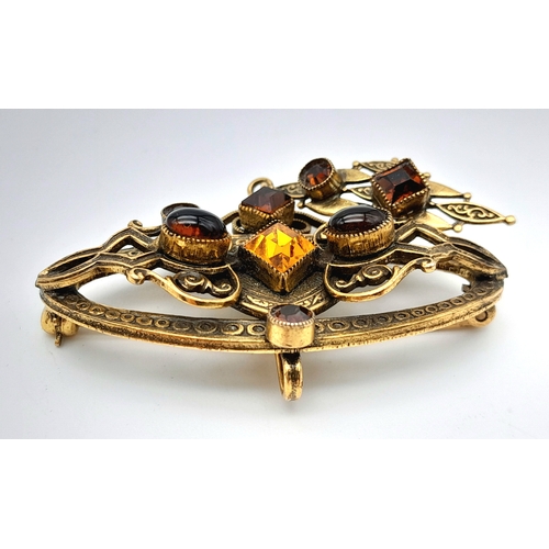 50 - A Vintage  'Original by Robert' Citrine Brooch. 6cm.