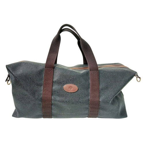 153 - A Mulberry Black Weekend Bag. Pebbled leather exterior with gold-toned hardware, two textile handles... 