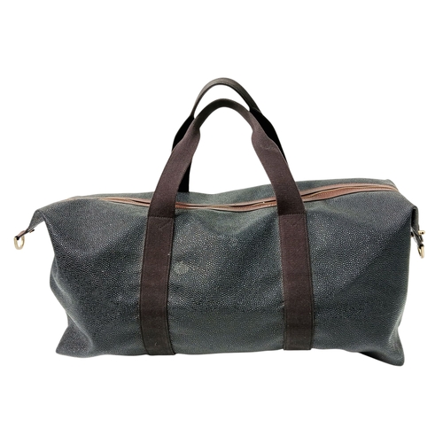 153 - A Mulberry Black Weekend Bag. Pebbled leather exterior with gold-toned hardware, two textile handles... 