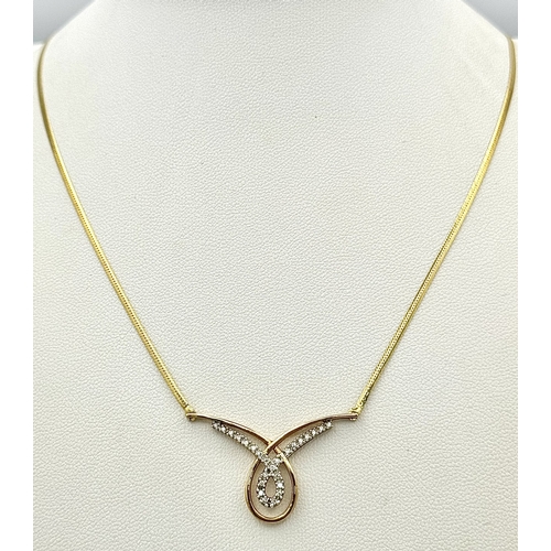 133 - Beautiful 9 CARAT GOLD and DIAMOND NECKLACE. 3.25 grams. 45 cm.
