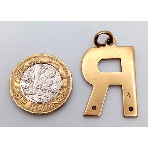 42 - Impressive 9 CARAT GOLD Gem Set LETTER  ‘R’. PENDANT. 6.5 grams. 3 cm x 2.0 cm approx.