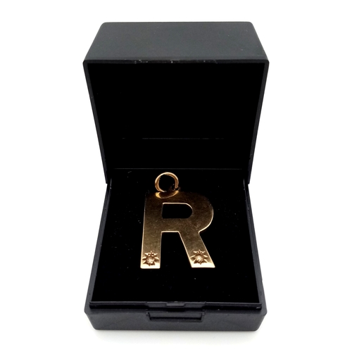 42 - Impressive 9 CARAT GOLD Gem Set LETTER  ‘R’. PENDANT. 6.5 grams. 3 cm x 2.0 cm approx.