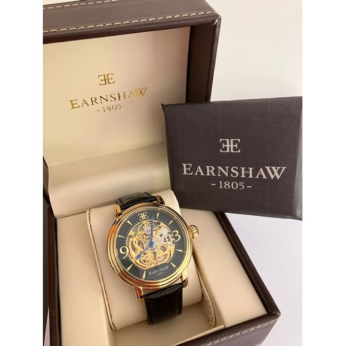 14 - Gentleman’s THOMAS EARNSHAW AUTOMATIC SKELETON WRISTWATCH. Finished in gold tone. Having large bold ... 