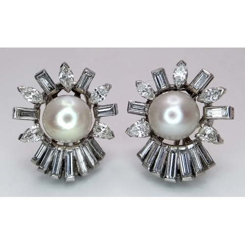 157 - A Pair of Sophisticated, Art Deco Platinum, Pearl and Diamond Earrings. The pair having 32 diamonds ... 