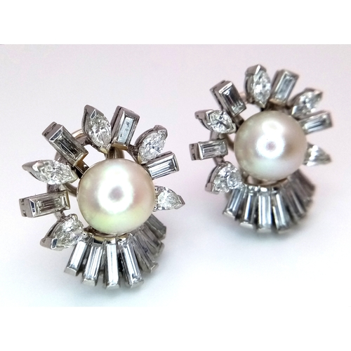 157 - A Pair of Sophisticated, Art Deco Platinum, Pearl and Diamond Earrings. The pair having 32 diamonds ... 