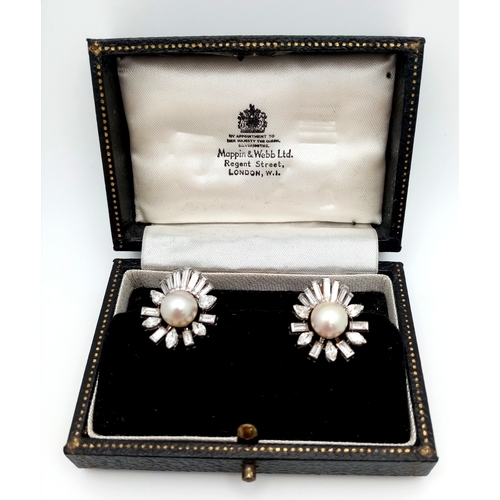 157 - A Pair of Sophisticated, Art Deco Platinum, Pearl and Diamond Earrings. The pair having 32 diamonds ... 
