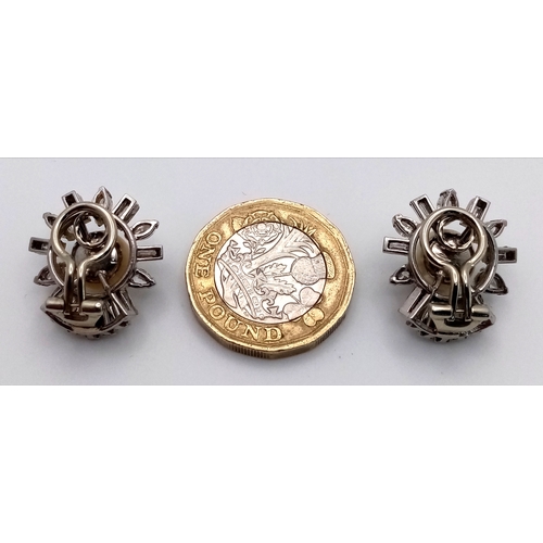 157 - A Pair of Sophisticated, Art Deco Platinum, Pearl and Diamond Earrings. The pair having 32 diamonds ... 