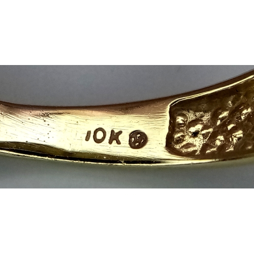 165 - A 10K Yellow Gold Graduating Channel Set Diamond Ring. Size R. 4.52g total weight.