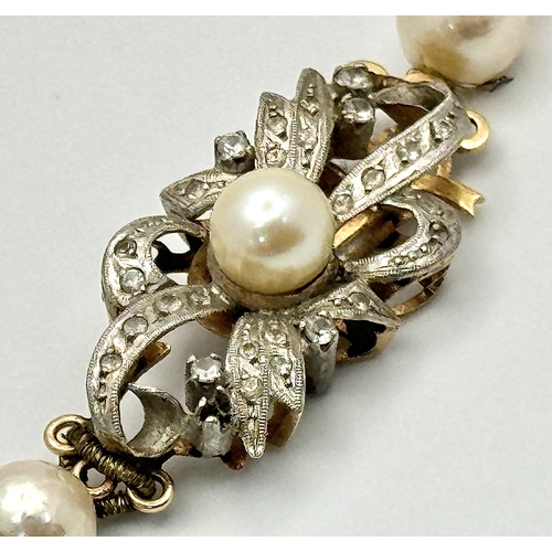 144 - A Vintage Single Strand Pearl Necklace with Elaborate 18K Gold Clasp. Pearls 6/7mm. 90cm. 40mm x 15m... 