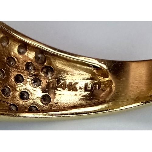 24 - A 14K Yellow Gold Interlocking Diamond Ring. Size S. 4.91g total weight.