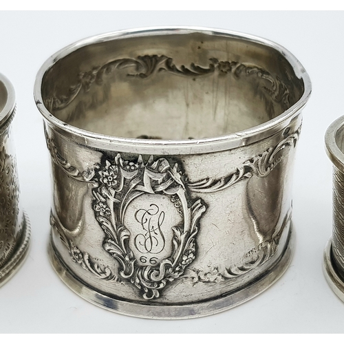 141 - Four Different Style Sterling Silver Napkin Rings. 97g total weight.