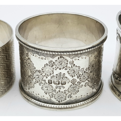 141 - Four Different Style Sterling Silver Napkin Rings. 97g total weight.