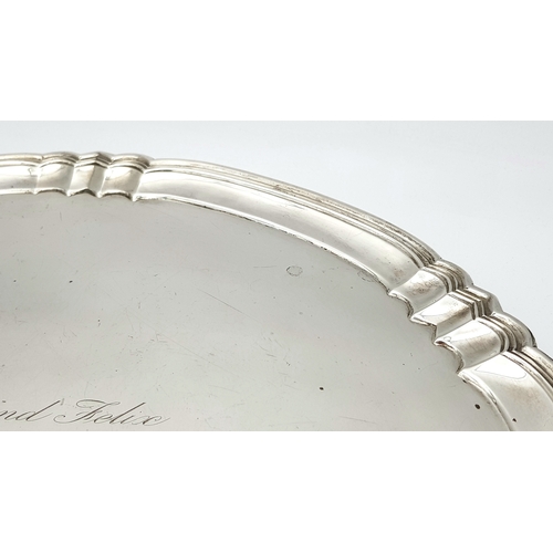 171 - A Vintage Garrard and Co. Sterling Silver Salver. Originally a wedding gift. Hallmarks for London 19... 