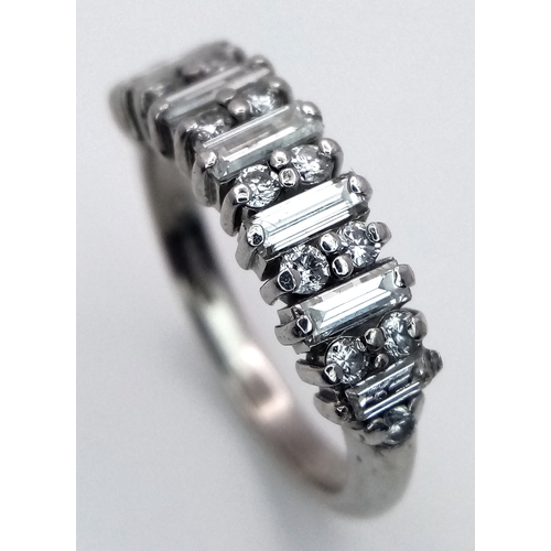 47 - AN 18K WHITE GOLD MIXED CUT DIAMOND RING - 0.35CTW. 4G. SIZE J. SC-1093.