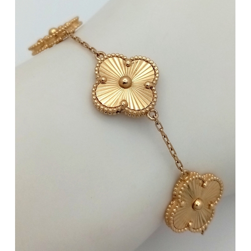 12 - A 14K YELLOW GOLD CLOVER STYLE BRACELET. 9G. 17CM. SC - 1065.