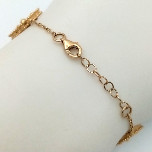 12 - A 14K YELLOW GOLD CLOVER STYLE BRACELET. 9G. 17CM. SC - 1065.