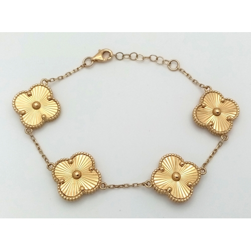 12 - A 14K YELLOW GOLD CLOVER STYLE BRACELET. 9G. 17CM. SC - 1065.