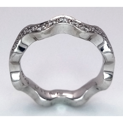 40 - AN 18K WHITE GOLD WAVY DIAMOND BAND RING - 0.20CTW. 5.5G. SIZE L. SC - 1096.