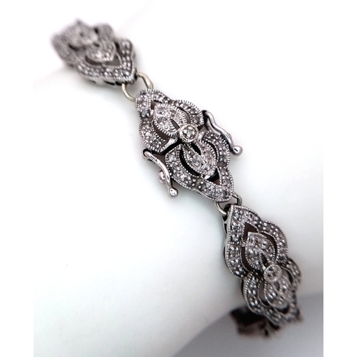 5 - A 14K WHITE GOLD DIAMOND SET ART DECO STYLE BRACELET. 11G. 1.50CTW DIAMONDS IN TOTAL. AS FOUND, SC-1... 