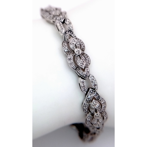 5 - A 14K WHITE GOLD DIAMOND SET ART DECO STYLE BRACELET. 11G. 1.50CTW DIAMONDS IN TOTAL. AS FOUND, SC-1... 