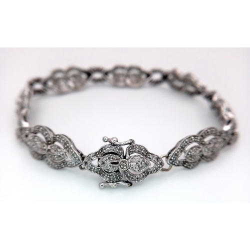 5 - A 14K WHITE GOLD DIAMOND SET ART DECO STYLE BRACELET. 11G. 1.50CTW DIAMONDS IN TOTAL. AS FOUND, SC-1... 