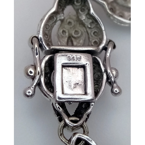 5 - A 14K WHITE GOLD DIAMOND SET ART DECO STYLE BRACELET. 11G. 1.50CTW DIAMONDS IN TOTAL. AS FOUND, SC-1... 