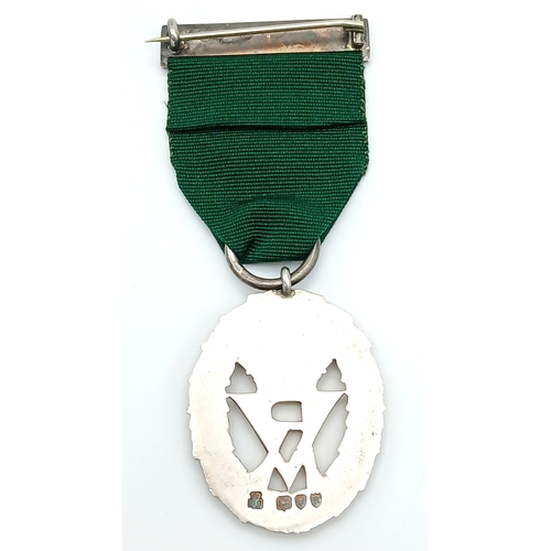 31 - A Volunteer Officers' Decoration (VR cipher); with hallmarks for 1892. Complete with top bar/brooch ... 