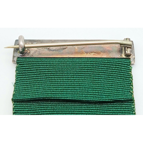 31 - A Volunteer Officers' Decoration (VR cipher); with hallmarks for 1892. Complete with top bar/brooch ... 