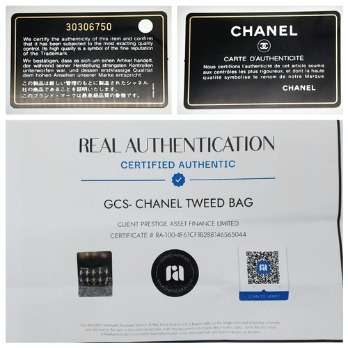 34 - A Chanel Black and White Tweed Flap Bag. Quilted tweed exterior with gold toned hardware, leather-in... 