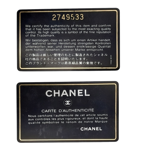 41 - A Chanel Brown Caviar Leather Shoulder Bag. Grained leather exterior with gold-toned hardware, dual ... 