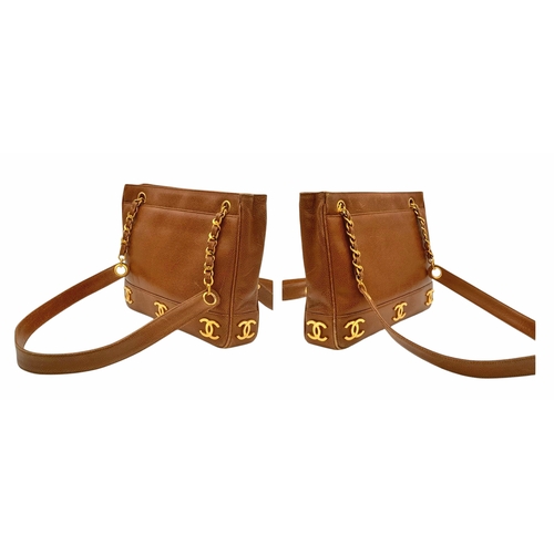 41 - A Chanel Brown Caviar Leather Shoulder Bag. Grained leather exterior with gold-toned hardware, dual ... 