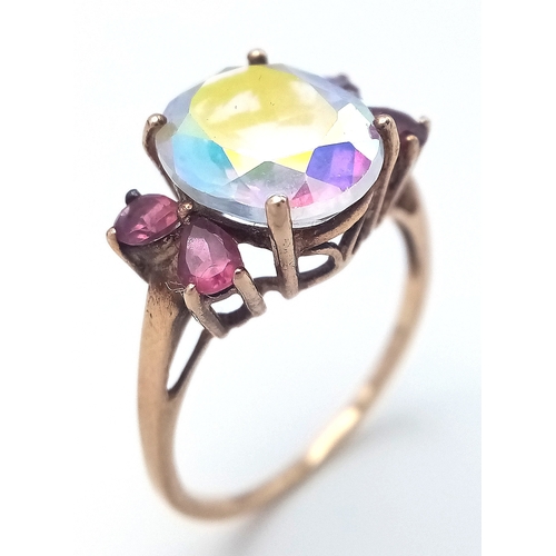 42 - Stunning 9 CARAT GOLD RING. Having large oval cut Mystic crystal set to top. Full UK hallmark. 3.7 g... 