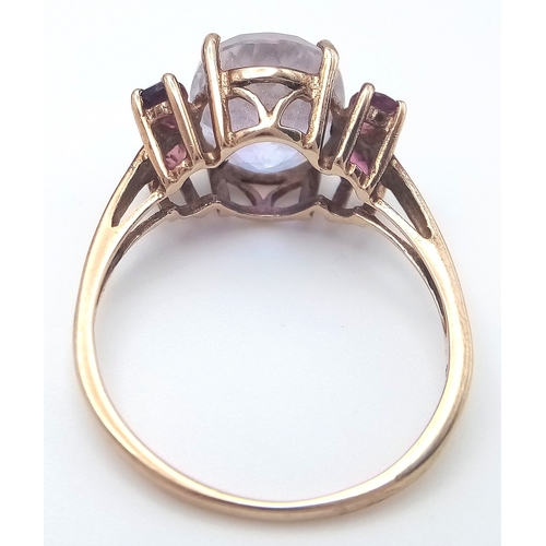 42 - Stunning 9 CARAT GOLD RING. Having large oval cut Mystic crystal set to top. Full UK hallmark. 3.7 g... 