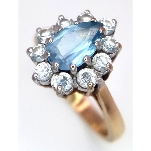11 - A 9K Yellow Gold, Aquamarine and White Stone Ring. Size M 1/2. 3.2g total weight.